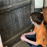Math practice on Tavern door